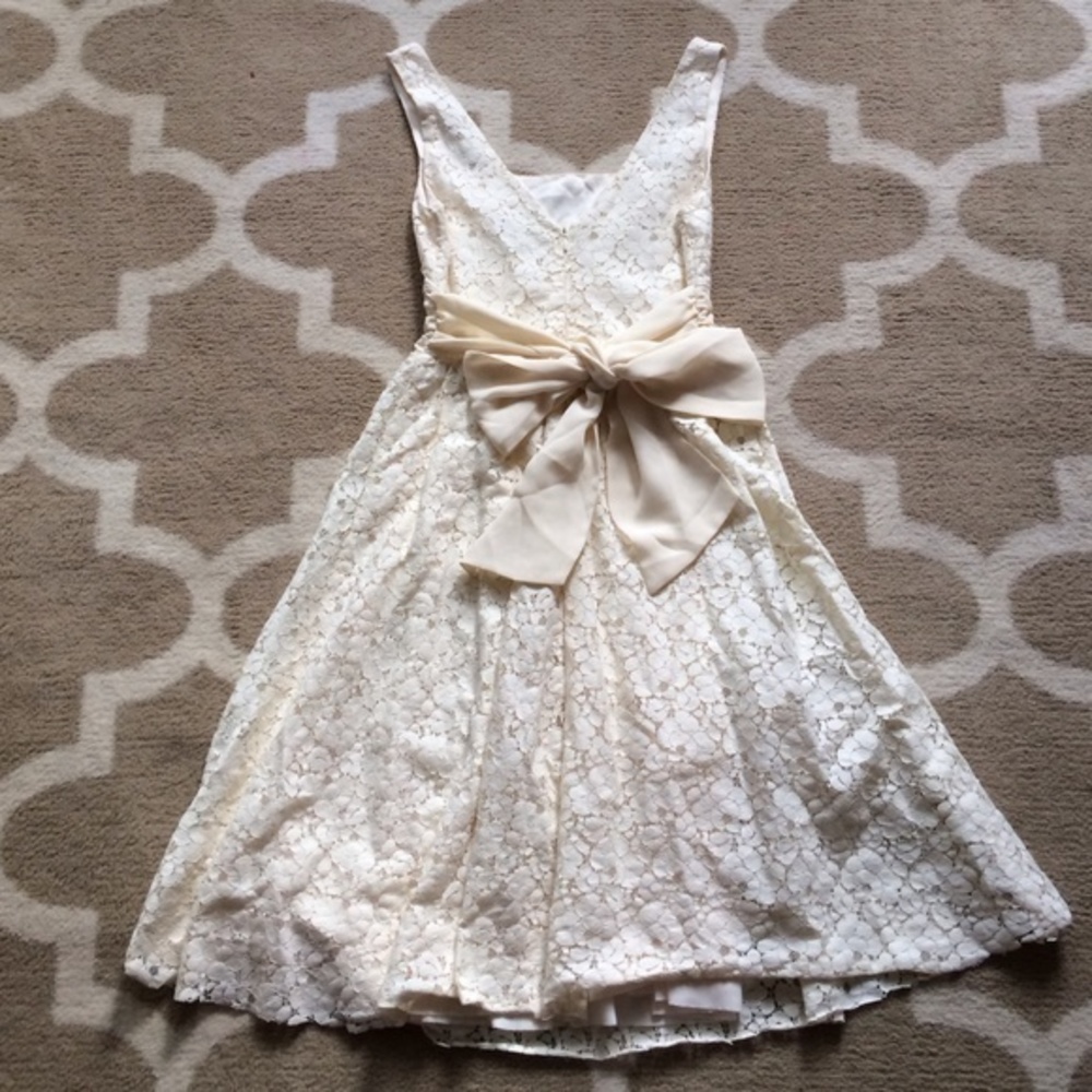 Forever 21 cream drew with bow in the back